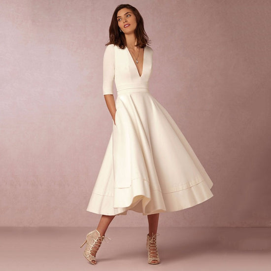 “Retro Swing Sleeve Dress – 60s-Inspired Women’s V-Neck Style”